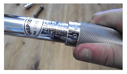 how to adjust a torque wrench